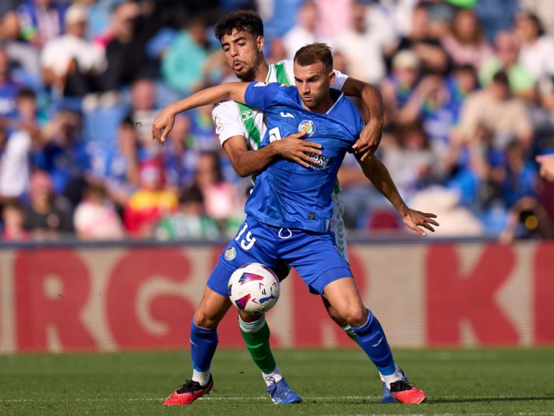 GETAFE, SPAIN - OCTOBER 21: Borja Mayoral of Getafe CF is challenged by Chadi Riad b during the LaLiga EA Sports match between Getafe CF and Real Betis at Coliseum Alfonso Perez on October 21, 2023 in Getafe, Spain. (Photo by Angel Martinez/Getty Images)