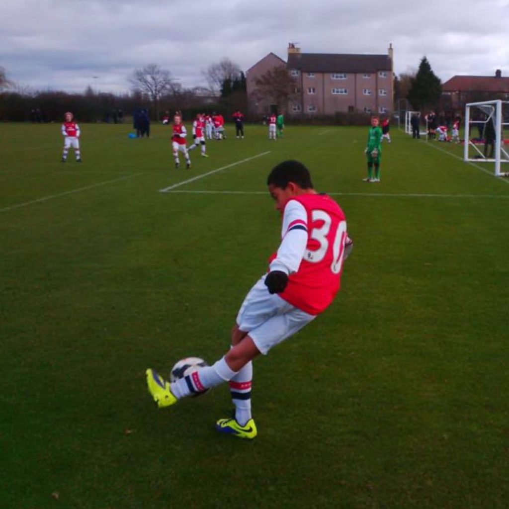 A young Miguel Azeez kicks the ball (Photo via Azeez on Instagram)