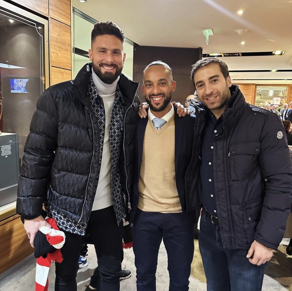 Olivier Giroud, Theo Walcott, and Mathieu Flamini attend an Arsenal game at the Emirates Stadium