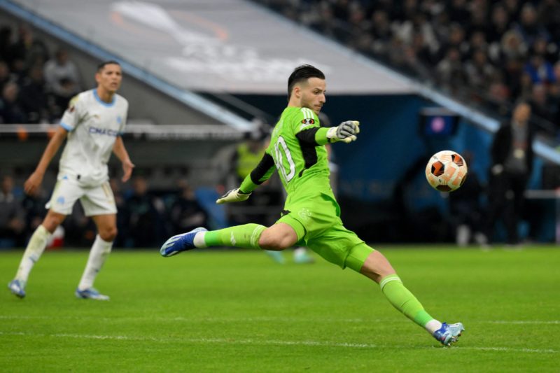 Ajax's German goalkeeper #40 Diant Ramaj kicks the ball during the UEFA Europa League Group B football match between Olympique de Marseille and Ajax Amsterdam at the Velodrome Stadium in Marseille, southeastern France, on November 30, 2023. (Photo by NICOLAS TUCAT/AFP via Getty Images)