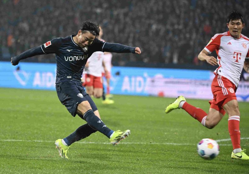 Bochum's Japanese forward #11 Takuma Asano scores the equalizer during the German first division Bundesliga football match between VfL Bochum and FC Bayern Munich in Bochum, western Germany on February 18, 2024. (Photo by INA FASSBENDER/AFP via Getty Images)