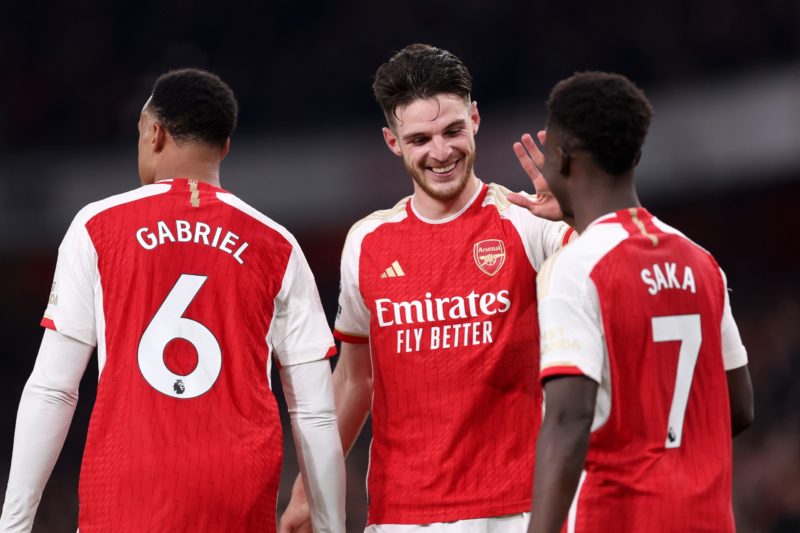 LONDON, ENGLAND - FEBRUARY 24: Declan Rice and Bukayo Saka of Arsenal celebrate after their teammate Jakub Kiwior of Arsenal (not pictured) scores his team's fourth goal during the Premier League match between Arsenal FC and Newcastle United at Emirates Stadium on February 24, 2024 in London, England. (Photo by Julian Finney/Getty Images)