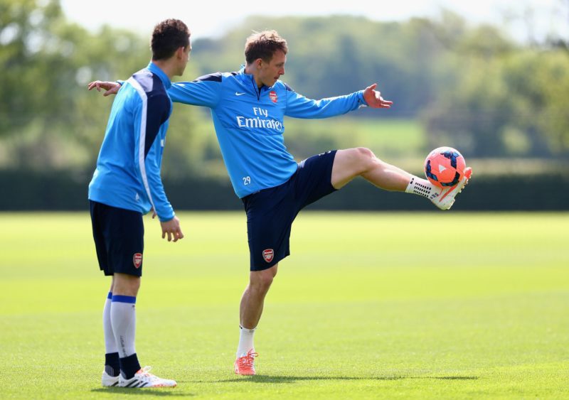 ST ALBANS, ENGLAND - MAY 14: Kim Kallstrom of Arsenal in action during a training session ahead of the FA Cup Final match between Arsenal and Hull City at London Colney on May 14, 2014 in St Albans, England. (Photo by Clive Mason/Getty Images)