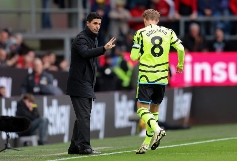 BURNLEY, ENGLAND - FEBRUARY 17: Mikel Arteta, Manager of Arsenal, gives instructions to Martin Odegaard during the Premier League match between Burnley FC and Arsenal FC at Turf Moor on February 17, 2024 in Burnley, England. (Photo by Matt McNulty/Getty Images)