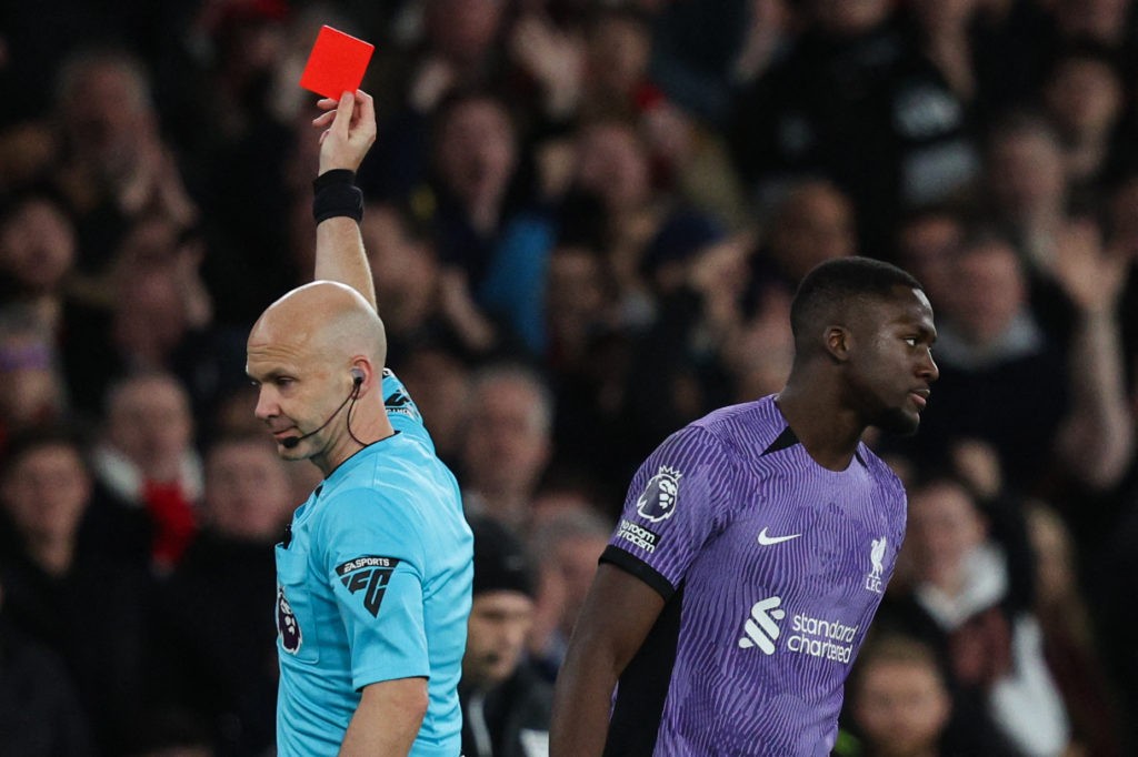 Referee Anthony Taylor shows a red card to Liverpool's French defender #05 Ibrahima Konate during the English Premier League football match between Arsenal and Liverpool at the Emirates Stadium in London on February 4, 2024. (Photo by ADRIAN DENNIS/AFP via Getty Images)