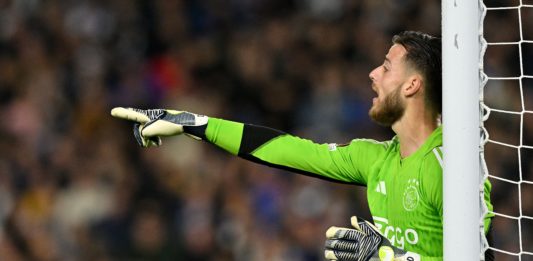Ajax's German goalkeeper #40 Diant Ramaj shouts to teammates during the UEFA Europa League Group B football match between Brighton and Hove Albion and Ajax at the American Express Community Stadium in Brighton, southern England on October 26, 2023. (Photo by GLYN KIRK/AFP via Getty Images)