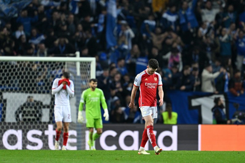 PORTO, PORTUGAL - FEBRUARY 21: Declan Rice of Arsenal looks dejected after Galeno of FC Porto (not pictured) scores his team's first goal during the UEFA Champions League 2023/24 round of 16 first leg match between FC Porto and Arsenal FC at Estadio do Dragao on February 21, 2024 in Porto, Portugal. (Photo by David Ramos/Getty Images)