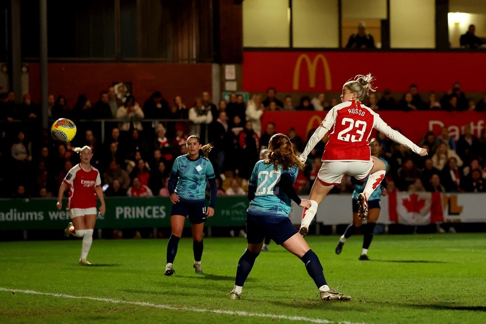 DARTFORD, ENGLAND: Alessia Russo of Arsenal scores her team's fourth goal during the FA Women's Continental Tyres League Cup Quarter Final match between London City Lionesses and Arsenal at Princes Park on February 14, 2024. (Photo by Richard Pelham/Getty Images)