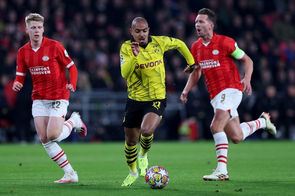 EINDHOVEN, NETHERLANDS: Donyell Malen of Borussia Dortmund in action during the UEFA Champions League 2023/24 round of 16 first leg match between PSV Eindhoven and Borussia Dortmund at Philips Stadion on February 20, 2024. (Photo by Dean Mouhtaropoulos/Getty Images)