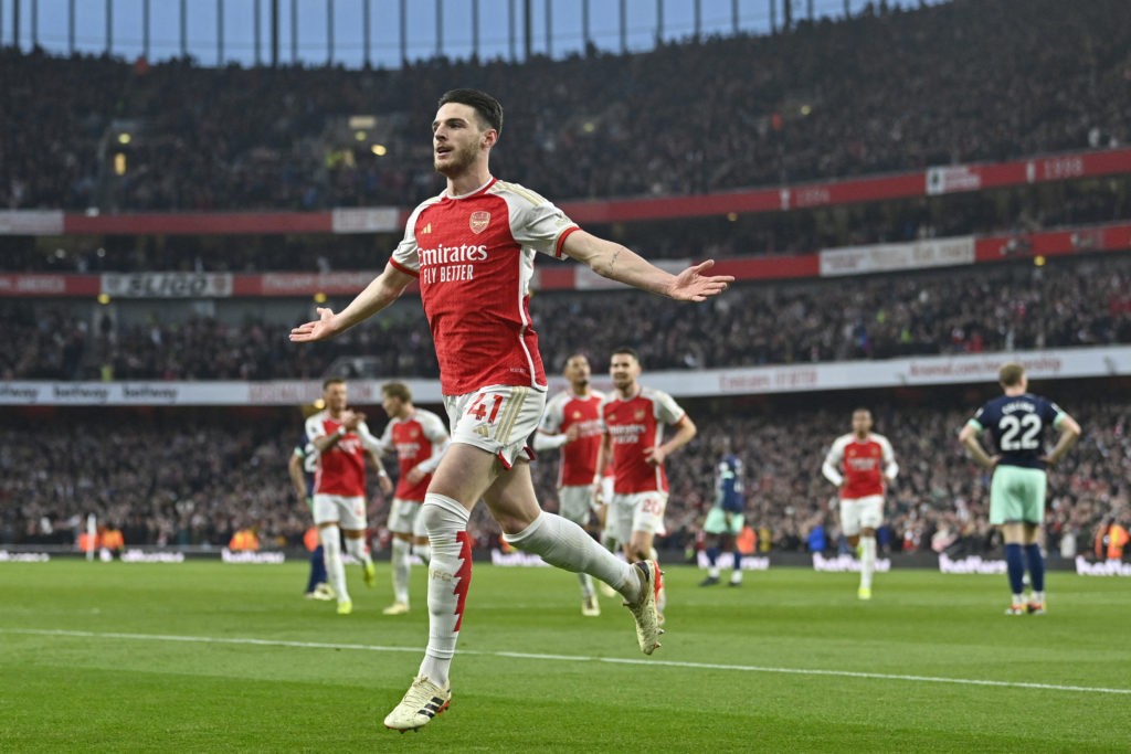 Arsenal's English midfielder #41 Declan Rice celebrates after scoring the opening goal of the English Premier League football match between Arsenal and Brentford at the Emirates Stadium in London on March 9, 2024. (Photo by JUSTIN TALLIS/AFP via Getty Images)