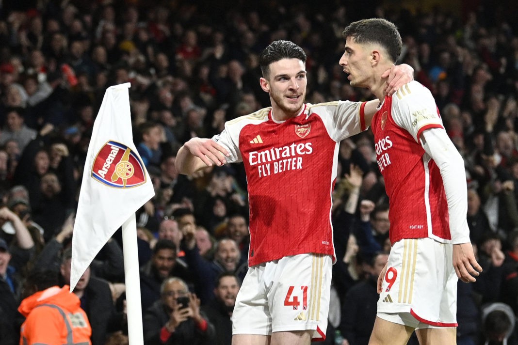 Arsenal's German midfielder #29 Kai Havertz (r) celebrates scoring the team's second goal WITH Arsenal's English midfielder #41 Declan Rice during the English Premier League football match between Arsenal and Brentford at the Emirates Stadium in London on March 9, 2024. (Photo by JUSTIN TALLIS/AFP via Getty Images)