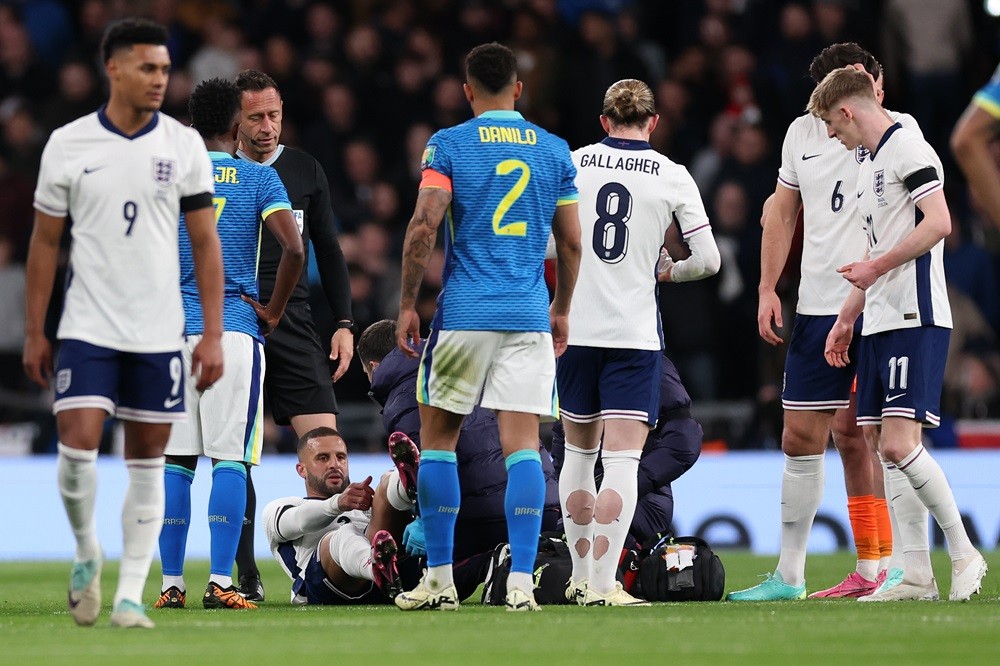 LONDON, ENGLAND: Kyle Walker of England receives medical treatment during the international friendly match between England and Brazil at Wembley Stadium on March 23, 2024. (Photo by Catherine Ivill/Getty Images)