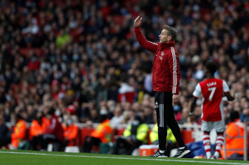 Arsenal's Dutch assistant coach Albert Stuivenberg shouts instructions to his players from the touchline during the English Premier League football match between Arsenal and Manchester City at the Emirates Stadium in London on January 1, 2022. - - (Photo by ADRIAN DENNIS/AFP via Getty Images)