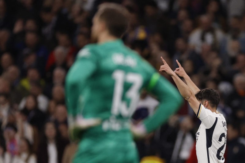Real Madrid's Spanish forward #21 Brahim Diaz celebrates scoring the opening goal during the Spanish league football match between Real Madrid CF and Club Atletico de Madrid at the Santiago Bernabeu stadium in Madrid on February 4, 2024. (Photo by OSCAR DEL POZO/AFP via Getty Images)