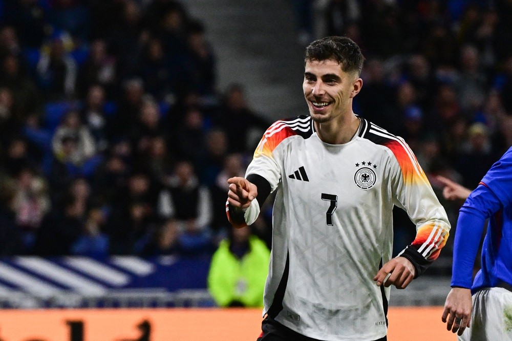 Germany's Kai Havertz celebrates after scoring Germany's second goal during the friendly football match between France and Germany, at the Groupama Stadium in Decines-Charpieu, near Lyon, on March 23, 2024. (Photo by OLIVIER CHASSIGNOLE/AFP via Getty Images)