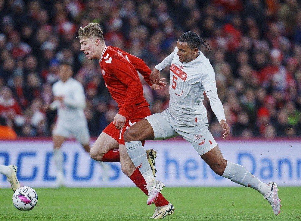 Denmark's Rasmus Hojlund (L) and Switzerland's Manuel Akanji vie for the ball during the friendly football match between Denmark and Switzerland in Copenhagen, Denmark, on March 23, 2024. (Photo by LISELOTTE SABROE/Ritzau Scanpix/AFP via Getty Images)