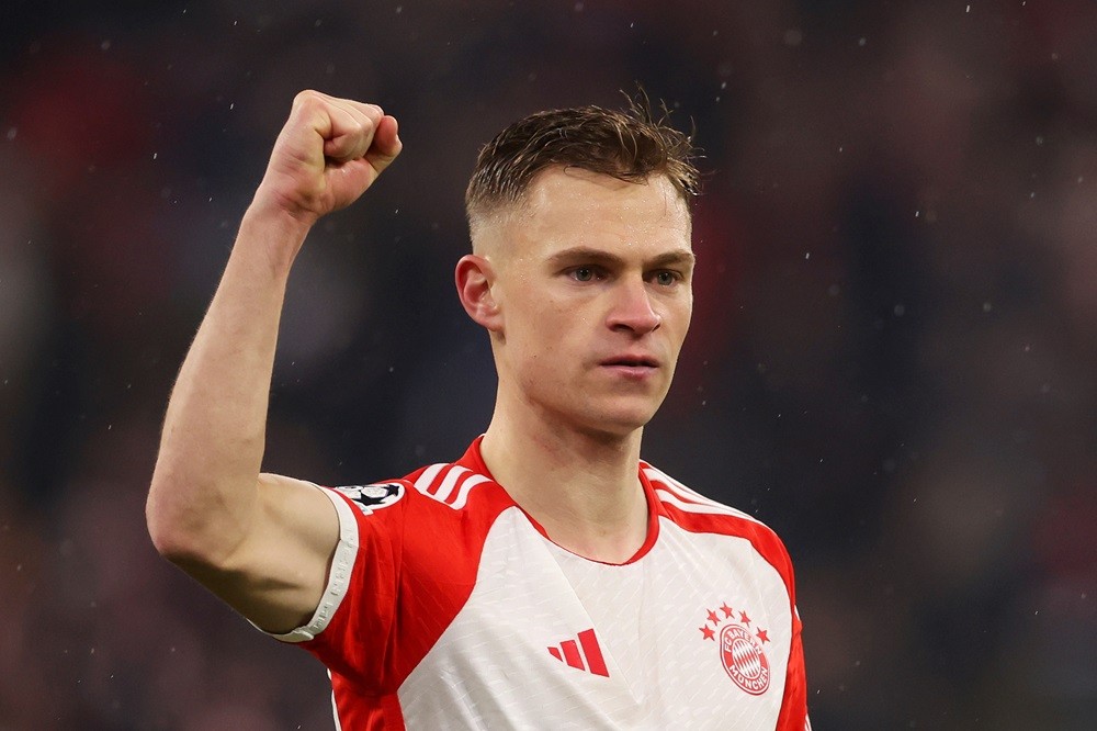 MUNICH, GERMANY: Joshua Kimmich of Bayern Munich celebrates victory in the UEFA Champions League 2023/24 round of 16 second leg match between FC Bayern München and SS Lazio at Allianz Arena on March 05, 2024. (Photo by Alexander Hassenstein/Getty Images)