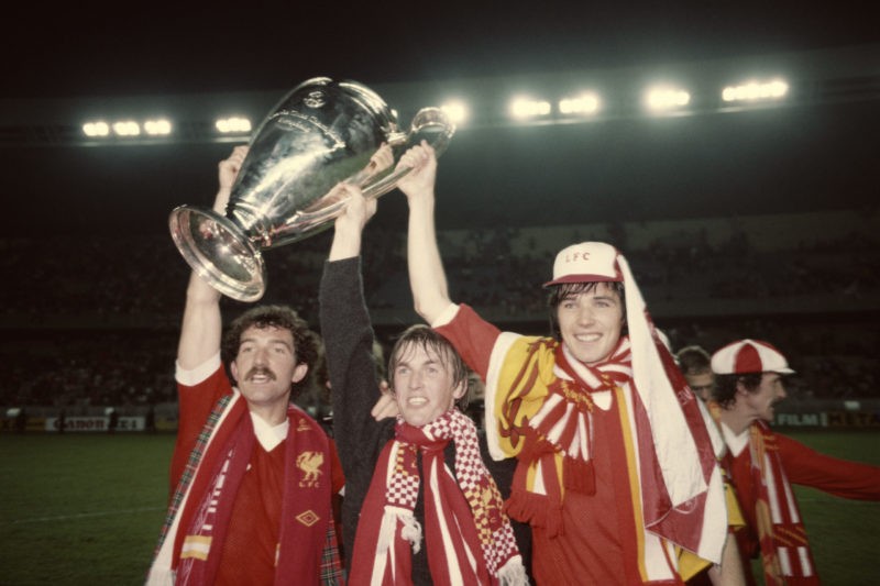 PARIS, FRANCE - MAY 27: Liverpool's Scotland players from left to right, Graeme Souness, Kenny Dalglish and Alan Hansen celebrate with the Euopean Cup after their 1-0 victory over Real Madrid at Parc de Princes on May 27, 1981 in Paris, France, Terry McDermott is seen to the far right. (Photo by Allsport/Getty Images/Hulton Archive)