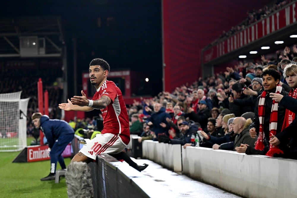 NOTTINGHAM, ENGLAND: Morgan Gibbs-White of Nottingham Forest reacts as he sits on an LED Board during the Emirates FA Cup Fifth Round match between Nottingham Forest and Manchester United at City Ground on February 28, 2024. (Photo by Michael Regan/Getty Images)