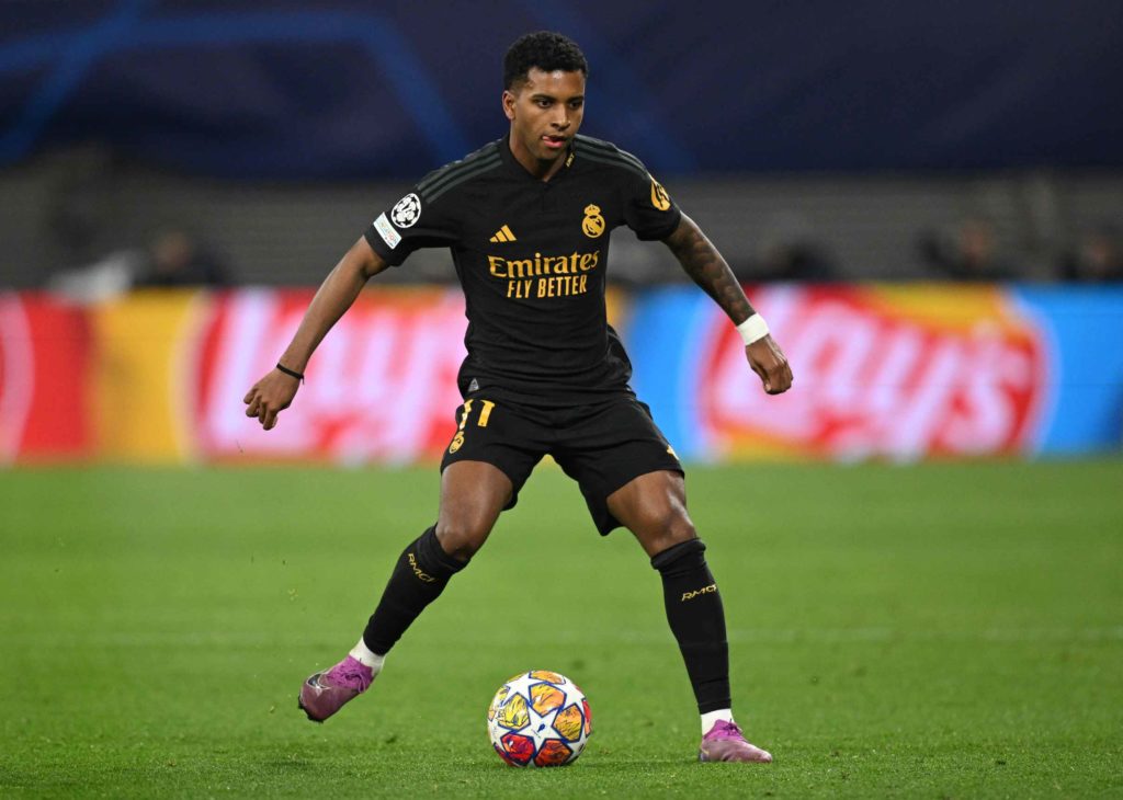 LEIPZIG, GERMANY - FEBRUARY 13: Rodrygo of Real Madrid in action during the UEFA Champions League 2023/24 round of 16 first leg match between RB Leipzig and Real Madrid CF at Red Bull Arena on February 13, 2024 in Leipzig, Germany. (Photo by Stuart Franklin/Getty Images)