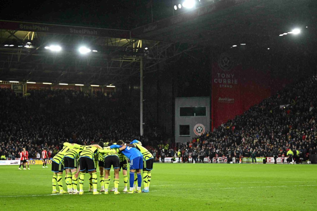 SHEFFIELD, ENGLAND - MARCH 04: Players of Arsenal huddle together prior to the Premier League match between Sheffield United and Arsenal FC at Bramall Lane on March 04, 2024 in Sheffield, England. (Photo by Michael Regan/Getty Images)