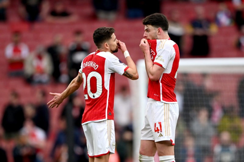 LONDON, ENGLAND - APRIL 14: Jorginho of Arsenal gestures to Declan Rice of Arsenal following the Premier League match between Arsenal FC and Aston Villa at Emirates Stadium on April 14, 2024 in London, England. (Photo by Shaun Botterill/Getty Images)