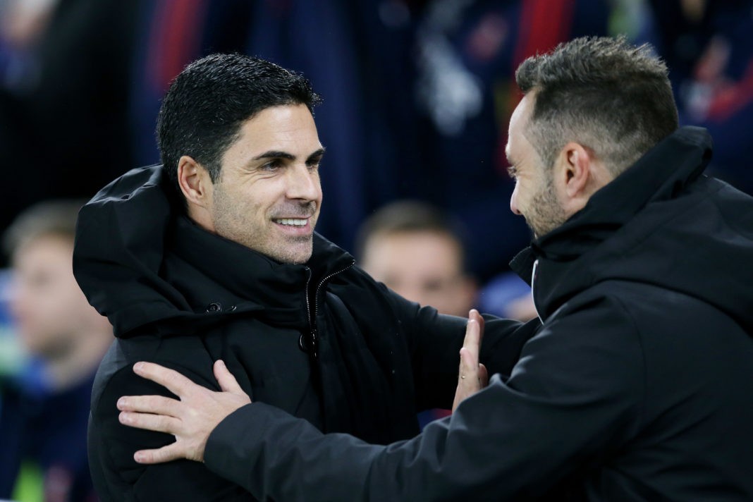 BRIGHTON, ENGLAND - DECEMBER 31: Mikel Arteta, Manager of Arsenal, embraces Roberto De Zerbi, Manager of Brighton & Hove Albion, prior to the Premier League match between Brighton & Hove Albion and Arsenal FC at American Express Community Stadium on December 31, 2022 in Brighton, England. (Photo by Steve Bardens/Getty Images)