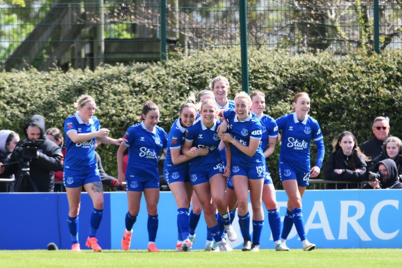LIVERPOOL, ENGLAND - APRIL 28: Issy Hobson of Everton celebrates scoring her team's first goal with teammates during the Barclays Women´s Super League match between Everton FC and Arsenal FC at Walton Hall Park on April 28, 2024 in Liverpool, England. (Photo by Ben Roberts Photo/Getty Images)