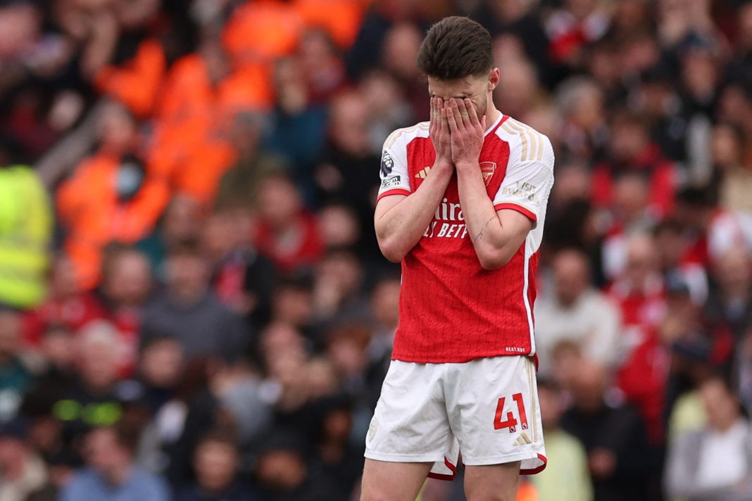 Arsenal's English midfielder #41 Declan Rice reacts to going two goals behind during the English Premier League football match between Arsenal and Aston VIlla at the Emirates Stadium in London on April 14, 2024. (Photo by ADRIAN DENNIS/AFP via Getty Images)