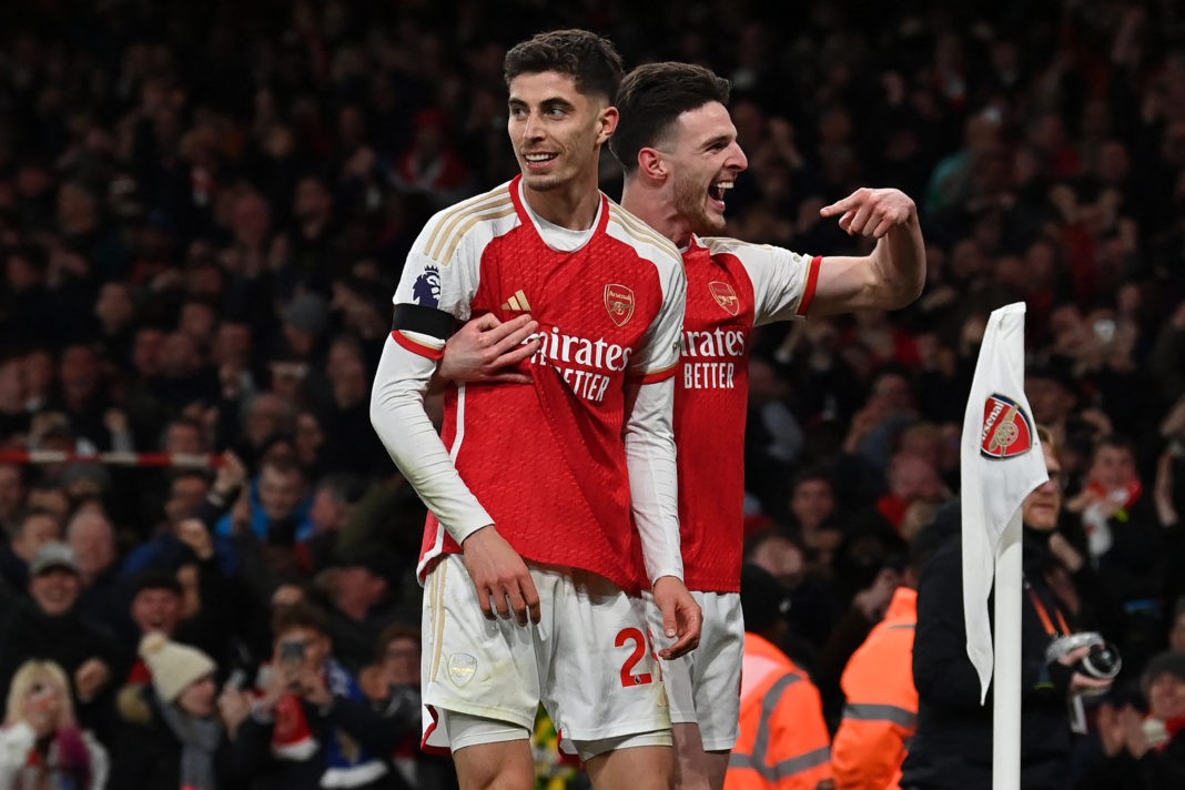 Arsenal's German midfielder #29 Kai Havertz (L) celebrates with Arsenal's English midfielder #41 Declan Rice (R) after scoring their third goal during the English Premier League football match between Arsenal and Chelsea at the Emirates Stadium in London on April 23, 2024. (Photo by GLYN KIRK/AFP via Getty Images)