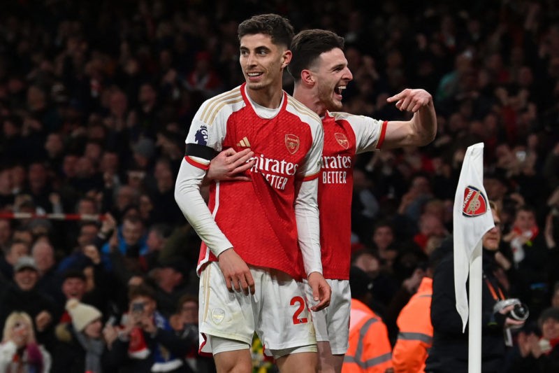Arsenal's German midfielder #29 Kai Havertz (L) celebrates with Arsenal's English midfielder #41 Declan Rice (R) after scoring their third goal during the English Premier League football match between Arsenal and Chelsea at the Emirates Stadium in London on April 23, 2024. (Photo by GLYN KIRK/AFP via Getty Images)