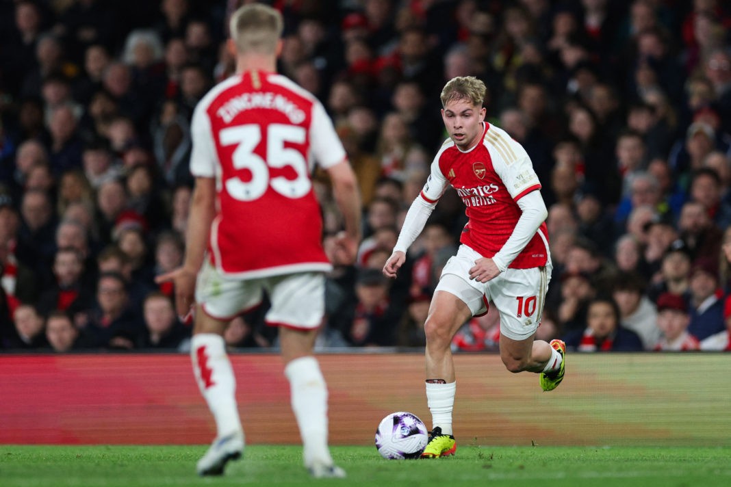 Arsenal's English midfielder #10 Emile Smith Rowe (R) controls the ball during the English Premier League football match between Arsenal and Luton Town at the Emirates Stadium in London on April 3, 2024. (Photo by ADRIAN DENNIS/AFP via Getty Images)