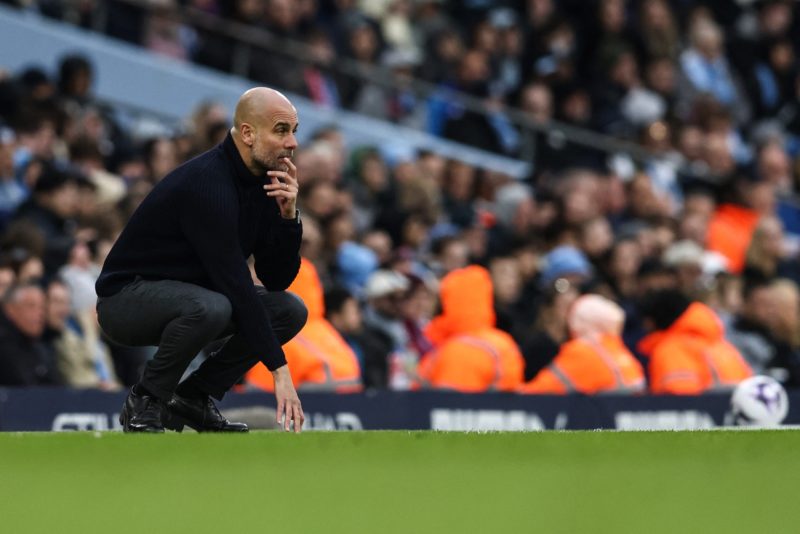 Manchester City's Spanish manager Pep Guardiola reacts during the English Premier League football match between Manchester City and Arsenal at the Etihad Stadium in Manchester, north west England, on March 31, 2024. (Photo by DARREN STAPLES/AFP via Getty Images)