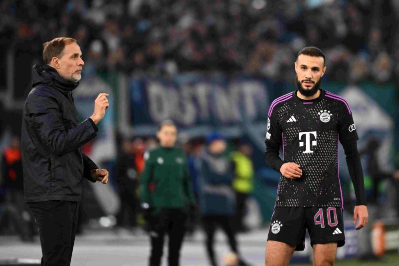 Bayern Munich's German head coach Thomas Tuchel (L) gestures next to Bayern Munich's Moroccan defender #40 Noussair Mazraoui during the UEFA Champions League last 16 first leg between Lazio and Bayern Munich at the Olympic stadium on February 14, 2024 in Rome. (Photo by ALBERTO PIZZOLI/AFP via Getty Images)