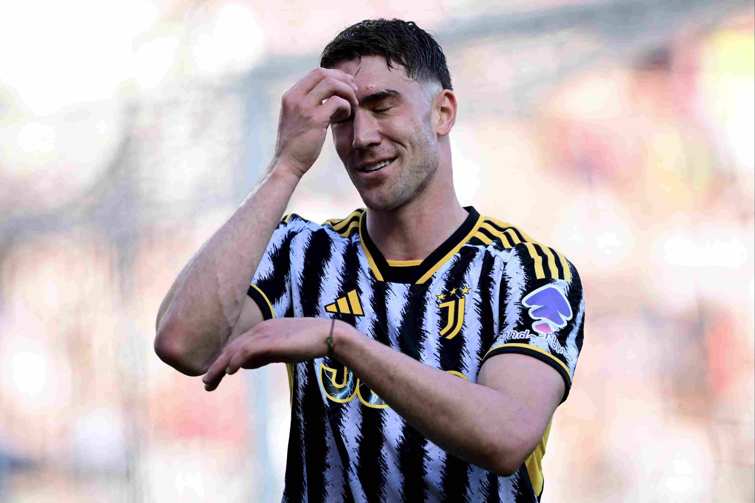 Juventus' Serbian forward #09 Dusan Vlahovic reacts during the Italian Serie A football match between Torino and Juventus at the Grande Torino Stadium in Turin on April 13, 2024.(Photo by MARCO BERTORELLO/AFP via Getty Images)
