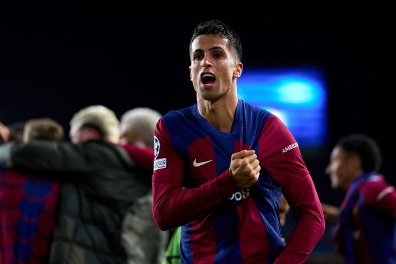 BARCELONA, SPAIN - MARCH 12: Joao Cancelo of FC Barcelona celebrates after his teammate Robert Lewandowski (not pictured) scored their team's third goal during the UEFA Champions League 2023/24 round of 16 second leg match between FC Barcelona and SSC Napoli at Estadi Olimpic Lluis Companys on March 12, 2024 in Barcelona, Spain. (Photo by Alex Caparros/Getty Images)