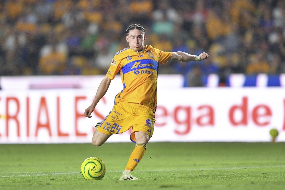 MONTERREY, MEXICO: Marcelo Flores of Tigres kicks the ball and scores the team's fifth goal during the 16th round match between Tigres UANL and Necaxa as part of the Torneo Clausura 2024 Liga MX at Universitario Stadium on April 20, 2024. (Photo by Azael Rodriguez/Getty Images)