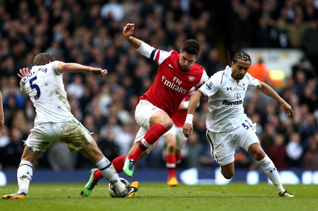 LONDON, ENGLAND - MARCH 03: Olivier Giroud of Arsenal is closed down by Jan Vertonghen (L) and Benoit Assou-Ekotto (R) of Spurs during the Barclays Premier League match between Tottenham Hotspur and Arsenal FC at White Hart Lane on March 3, 2013 in London, England. (Photo by Paul Gilham/Getty Images)