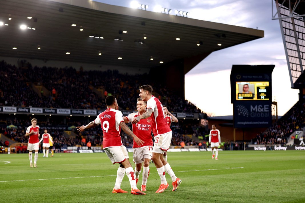 WOLVERHAMPTON, ENGLAND - APRIL 20: Leandro Trossard of Arsenal celebrates scoring his team's first goal with teammates Gabriel Jesus and Jakub Kiwior during the Premier League match between Wolverhampton Wanderers and Arsenal FC at Molineux on April 20, 2024 in Wolverhampton, England. (Photo by Naomi Baker/Getty Images)