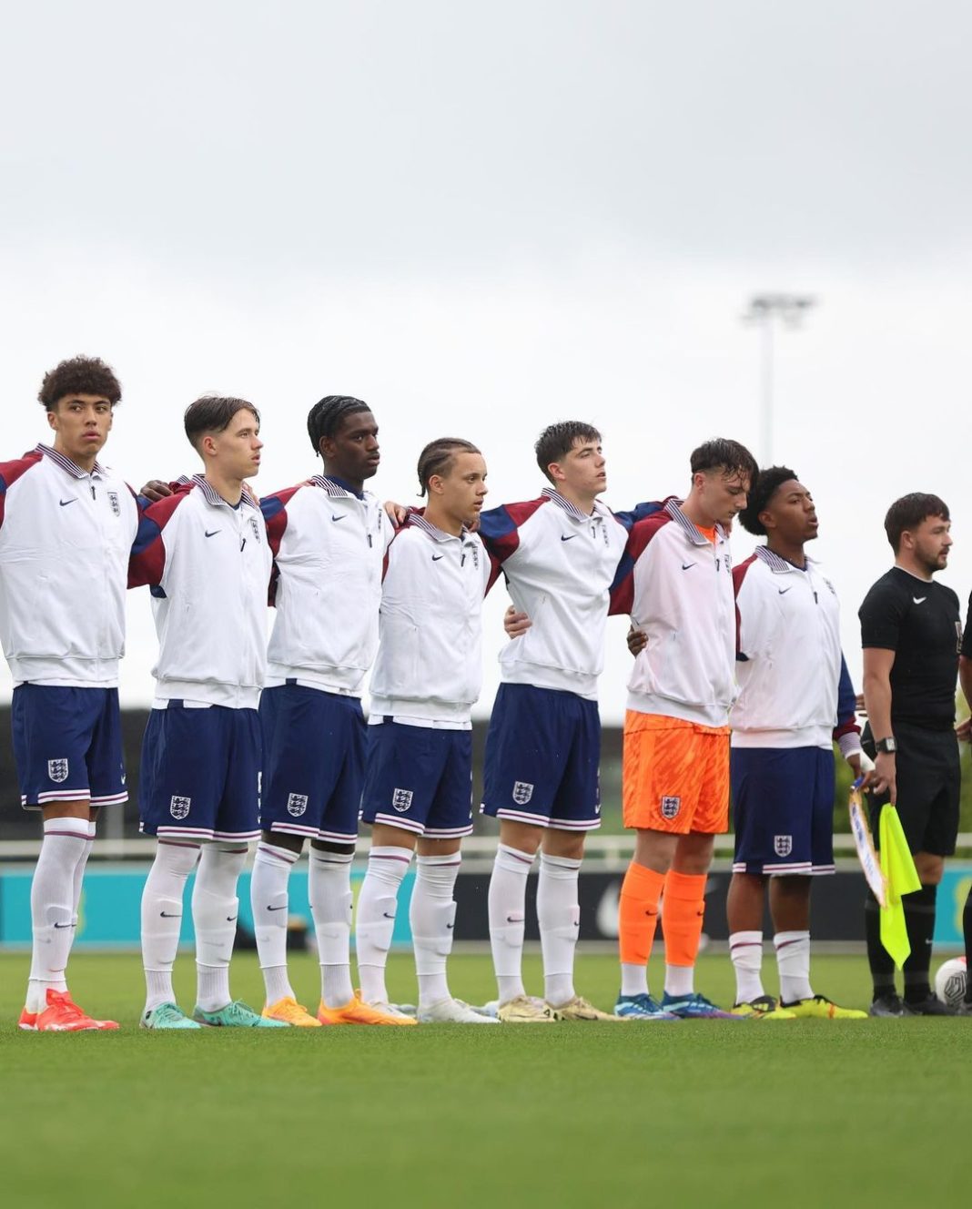 Ayden Heaven (3L) and Myles Lewis-Skelly (2R) lineup before a game for the England u18s (Photo via Heaven on Instagram)