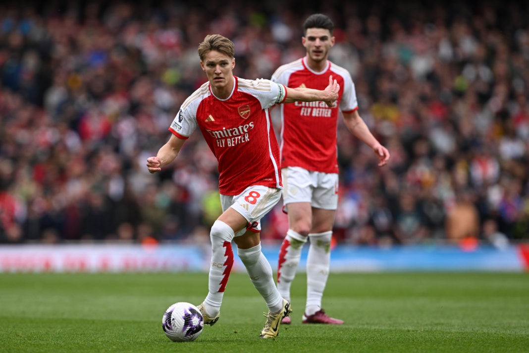 LONDON, ENGLAND - APRIL 14: Martin Odegaard and Declan Rice of Arsenal in action during the Premier League match between Arsenal FC and Aston Villa at Emirates Stadium on April 14, 2024 in London, England. (Photo by Mike Hewitt/Getty Images)