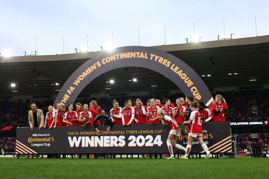 WOLVERHAMPTON, ENGLAND - MARCH 31: Arsenal players celebrate with the trophy after the FA Women's Continental Tyres League Cup Final match between Arsenal and Chelsea at Molineux on March 31, 2024 in Wolverhampton, England. (Photo by Marc Atkins/Getty Images)