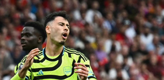 Arsenal's Brazilian midfielder #11 Gabriel Martinelli reacts during the English Premier League football match between Manchester United and Arsenal at Old Trafford in Manchester, north west England, on May 12, 2024. (Photo by PAUL ELLIS/AFP via Getty Images)