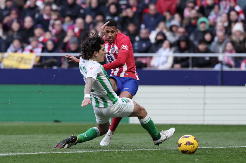 Real Betis' Spanish defender #02 Hector Bellerin vies with Atletico Madrid's Brazilian forward #12 Samuel Lino during the Spanish league football match between Club Atletico de Madrid and Real Betis at the Metropolitano stadium in Madrid on March 3, 2024. (Photo by THOMAS COEX/AFP via Getty Images)