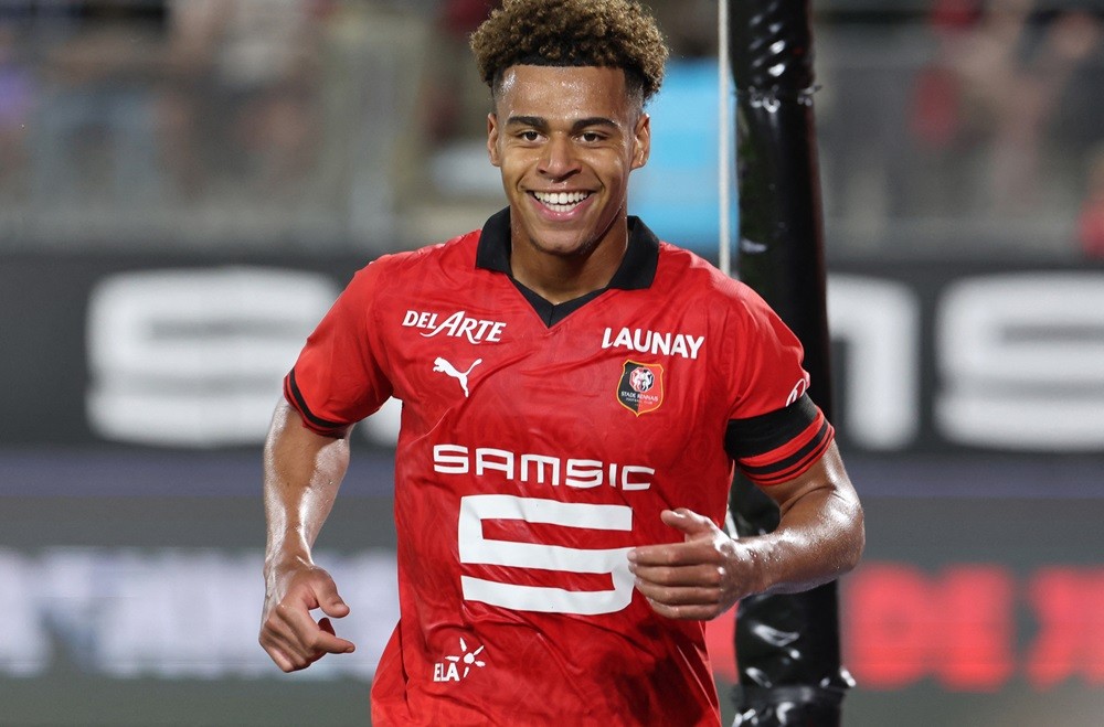 Rennes' Desire Doue celebrate after scoring his team's opening goal during the French L1 football match between Stade Rennais FC and Toulouse FC at The Roazhon Park Stadium in Rennes, western France, on April 13, 2024. (Photo by FRED TANNEAU/AFP via Getty Images)