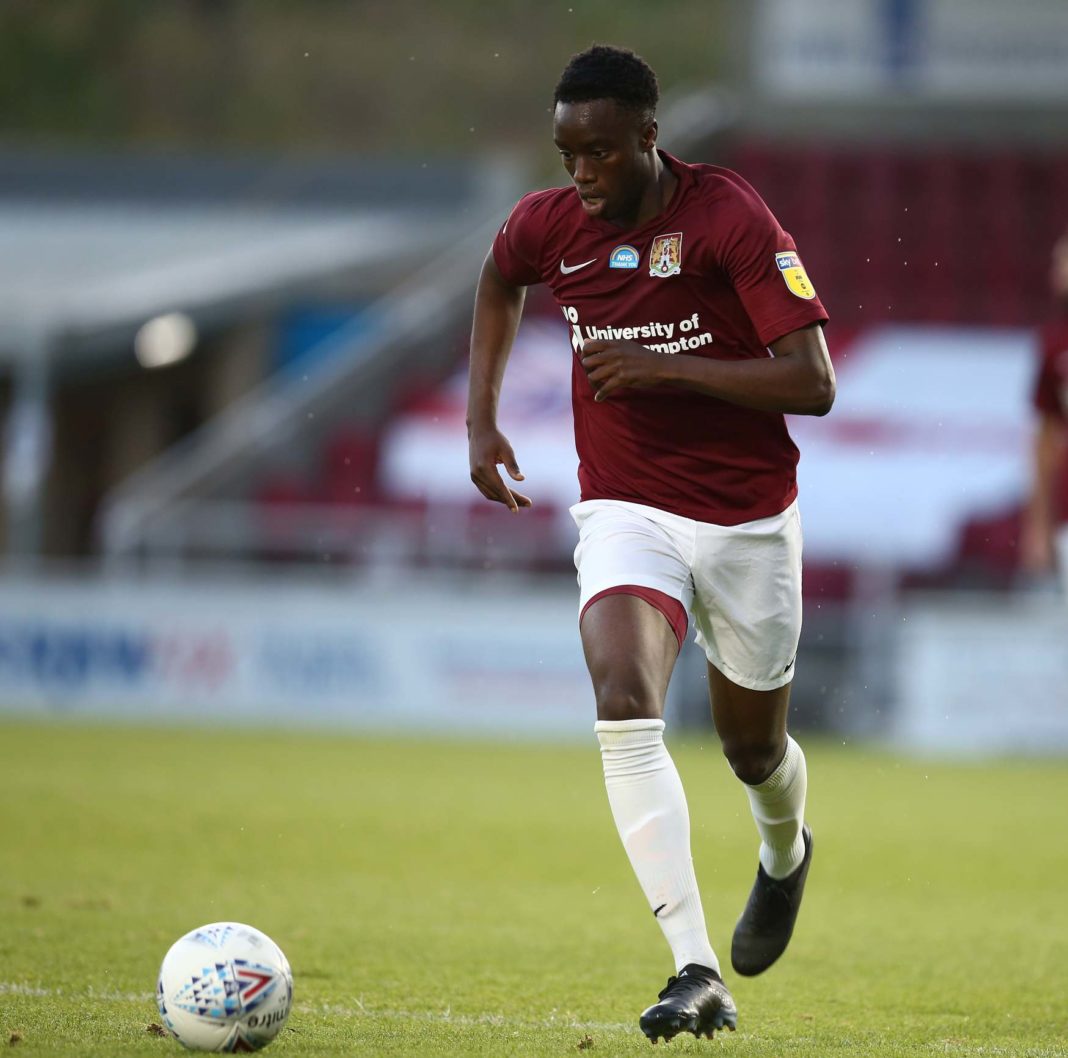 NORTHAMPTON, ENGLAND - JUNE 18: James Olayinka of Northampton Town in action during the Sky Bet League Two Play Off Semi-final 1st Leg match between Northampton Town and Cheltenham Town at PTS Academy Stadium on June 18, 2020 in Northampton, England. (Photo by Pete Norton/Getty Images)
