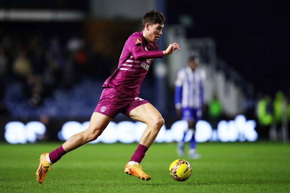 SHEFFIELD, ENGLAND: Rubin Colwill of Cardiff City runs with the ball during the Emirates FA Cup Third Round match between Sheffield Wednesday and Cardiff City at Hillsborough on January 06, 2024. (Photo by Jess Hornby/Getty Images)