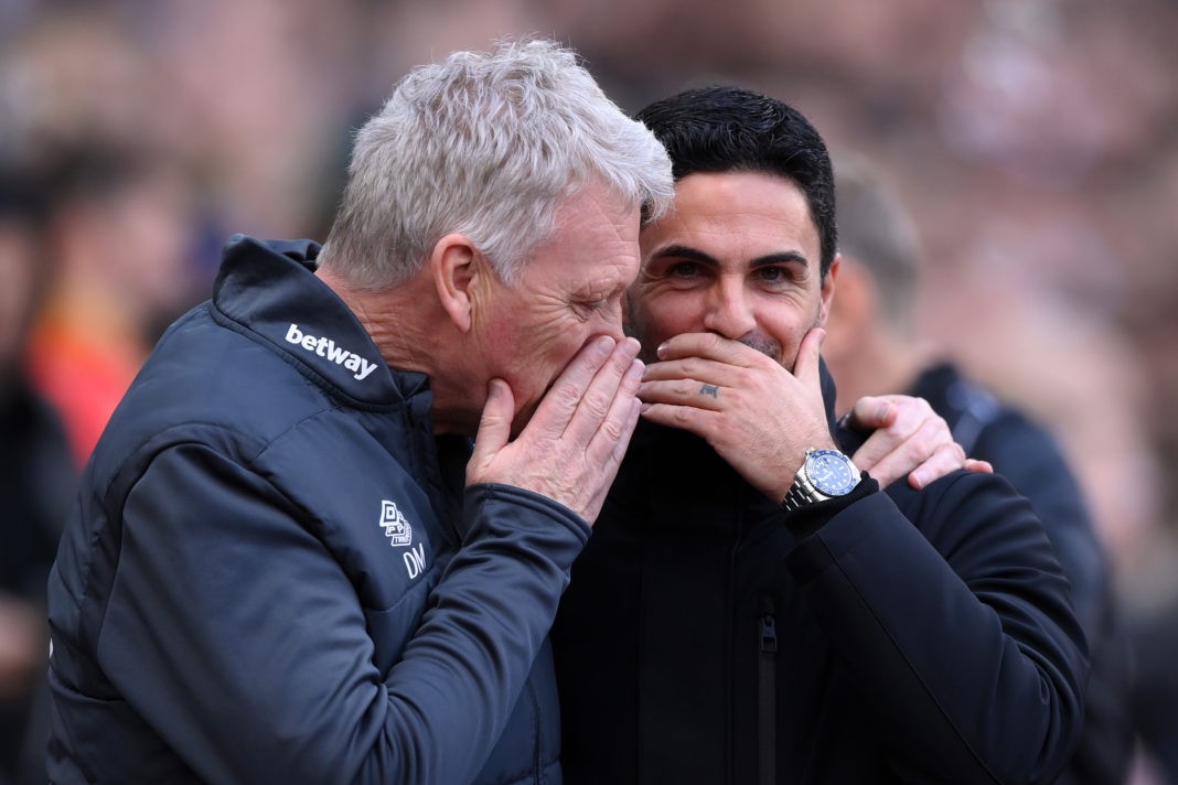 LONDON, ENGLAND - FEBRUARY 11: David Moyes, Manager of West Ham United, embraces Mikel Arteta, Manager of Arsenal, prior to the Premier League match between West Ham United and Arsenal FC at London Stadium on February 11, 2024 in London, England. (Photo by Justin Setterfield/Getty Images)