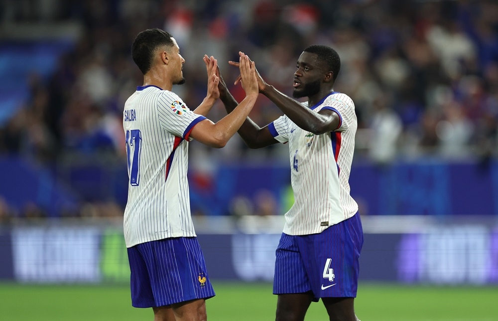 DUSSELDORF, GERMANY: William Saliba of France celebrates victory with teammate Dayot Upamecano during the UEFA EURO 2024 group stage match between Austria and France at Düsseldorf Arena on June 17, 2024. (Photo by Kevin C. Cox/Getty Images)