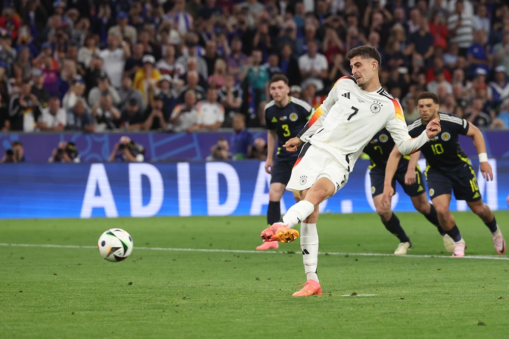 MUNICH, GERMANY: Kai Havertz of Germany scores his team's third goal from the penalty-spot during the UEFA EURO 2024 group stage match between Germany and Scotland at Munich Football Arena on June 14, 2024. (Photo by Alexander Hassenstein/Getty Images)